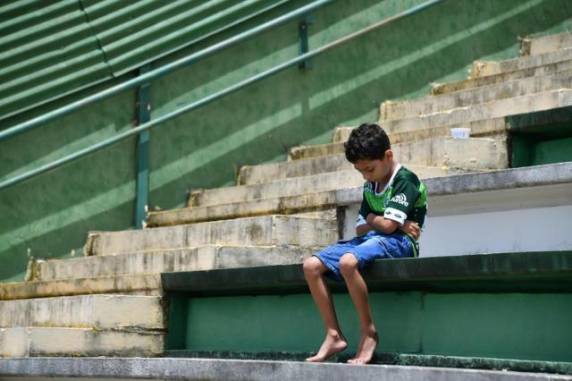 Imagem 

do torcedor de sete anos ganhou o mundo através das lentes de fotógrafo da Agência France-Presse e simbolizou a dor de uma torcida